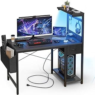 Grandder Escritorio Gaming 120 cm con Enchufe LED RGB Estantes Abatibles Cajón Organizador para PC Portátil Hogar/Oficina Incluye Bolso Fibra Carbono Negro